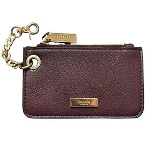 Dune London coin purse in a dark plum leather, gold toned keychain